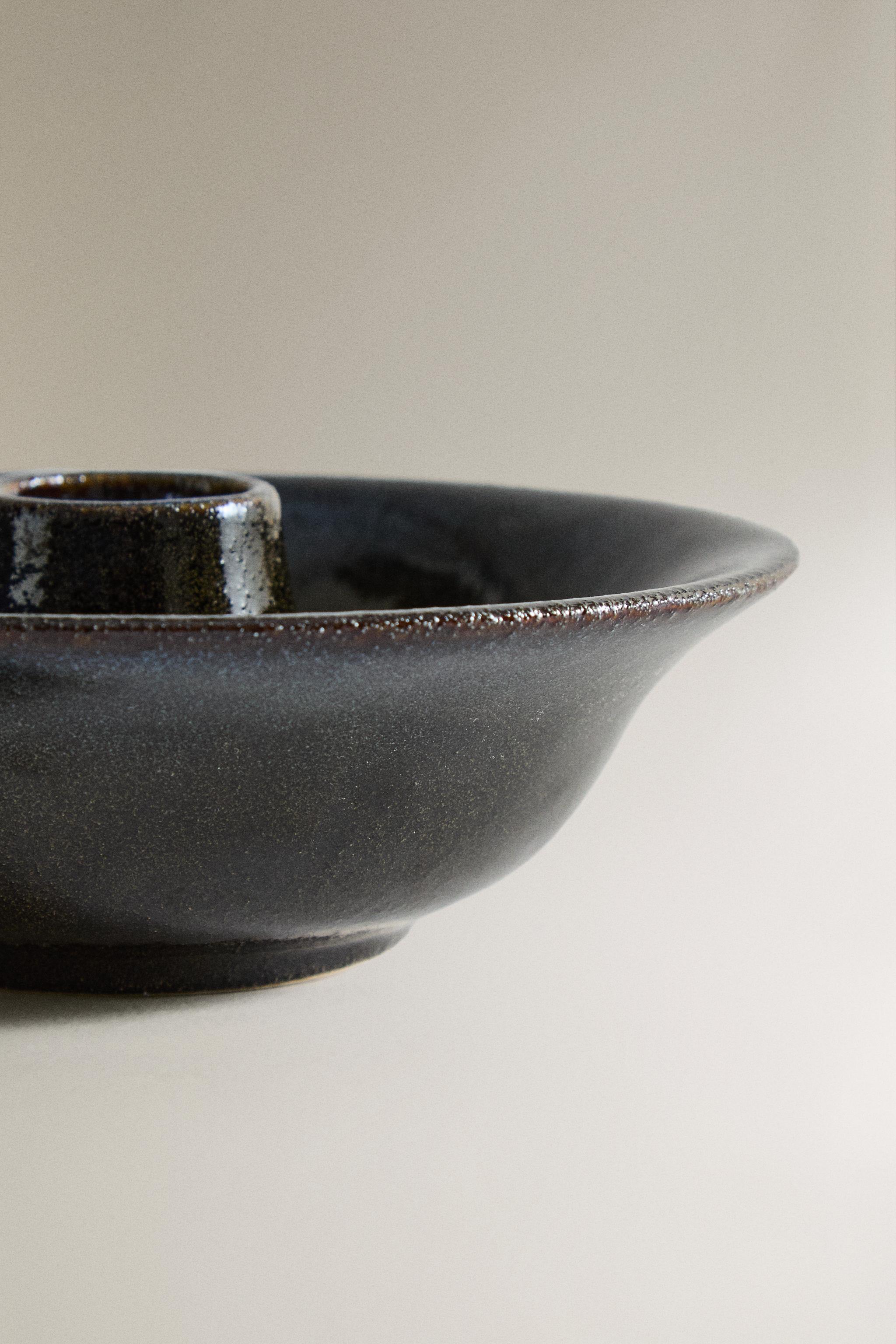 IRON AND STONEWARE CANDLEHOLDER